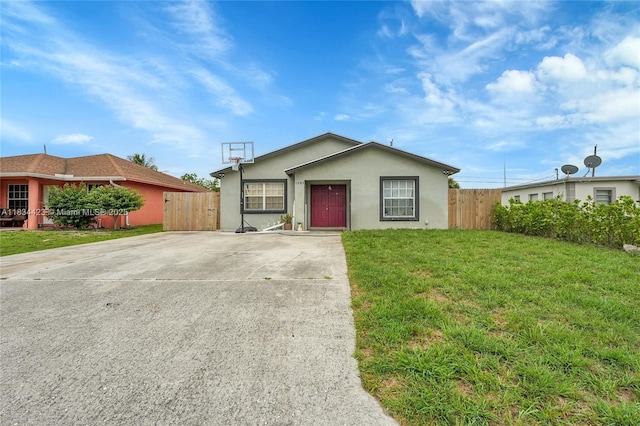 1303 W 6th St, Riviera Beach, FL 33404 - ranch-style home featuring driveway and stucco siding