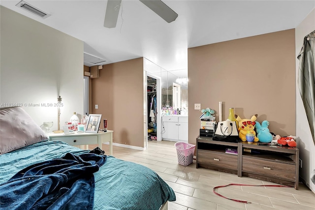 1303 W 6th St, Riviera Beach, FL 33404 - bedroom with a walk in closet, ceiling fan, and a closet