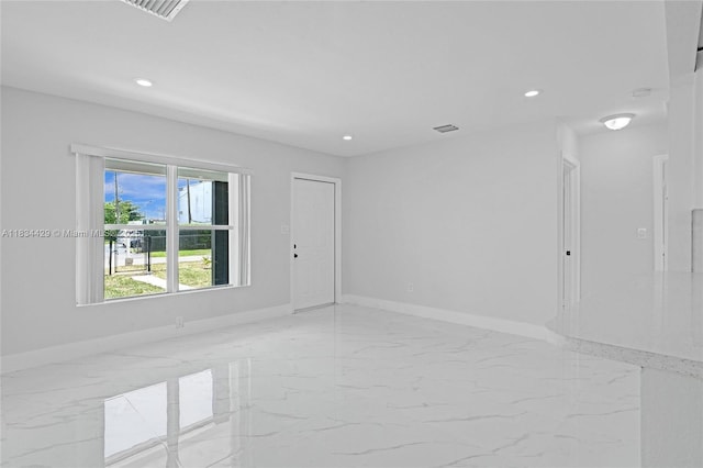 1610 S 29th Ave, Hollywood, FL 33020 - empty room featuring marble tiled flooring and recessed lighting