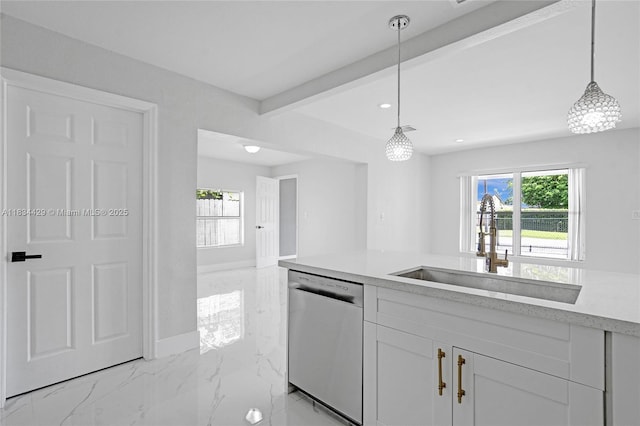 1610 S 29th Ave, Hollywood, FL 33020 - kitchen with stainless steel dishwasher, light marble finish flooring, light countertops, healthy amount of natural light, and recessed lighting