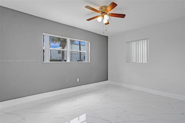 1610 S 29th Ave, Hollywood, FL 33020 - empty room featuring marble finish floors and a ceiling fan