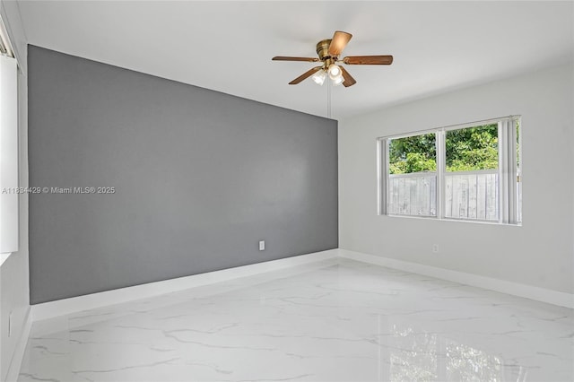 1610 S 29th Ave, Hollywood, FL 33020 - spare room with marble finish flooring and a ceiling fan