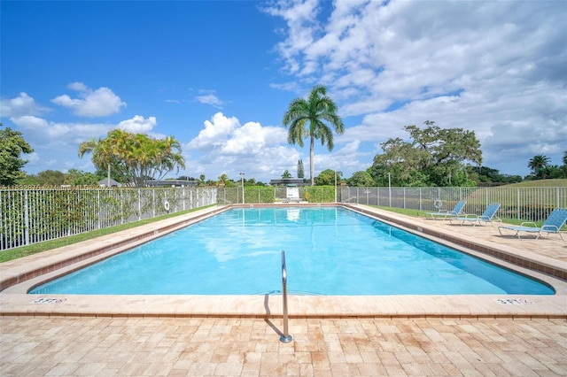 5820 Australian Pine Dr, Tamarac, FL 33319 - community pool with a patio area