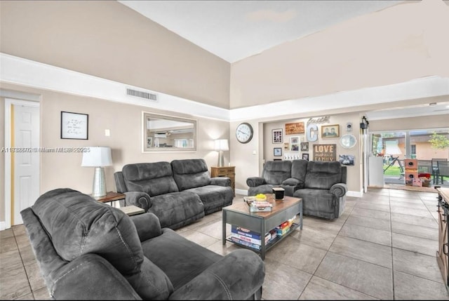 5820 Australian Pine Dr, Tamarac, FL 33319 - living room featuring a high ceiling and light tile patterned flooring