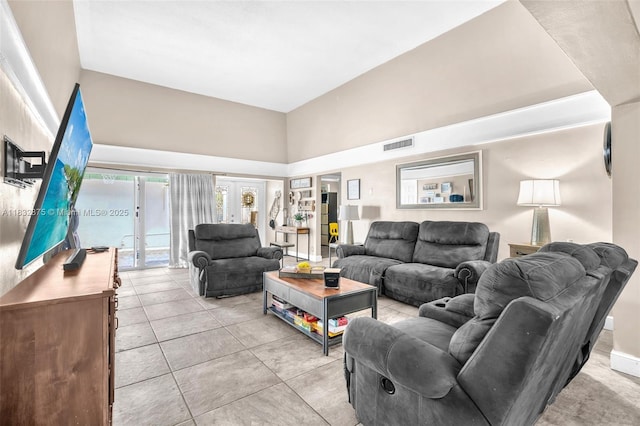 5820 Australian Pine Dr, Tamarac, FL 33319 - living room featuring a high ceiling and light tile patterned floors