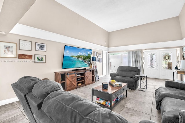 5820 Australian Pine Dr, Tamarac, FL 33319 - living area featuring a towering ceiling and baseboards