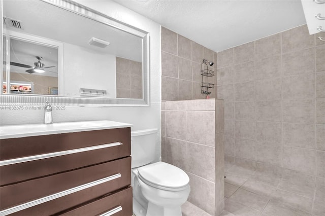 5820 Australian Pine Dr, Tamarac, FL 33319 - bathroom featuring walk in shower, tile walls, vanity, and a ceiling fan