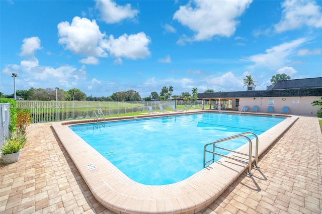 5820 Australian Pine Dr, Tamarac, FL 33319 - community pool with a patio area
