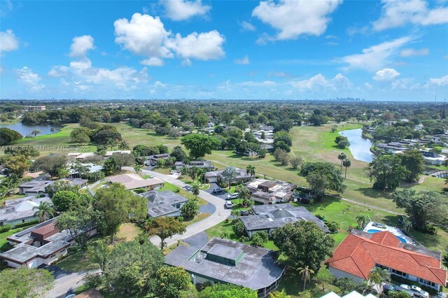 5820 Australian Pine Dr, Tamarac, FL 33319 - aerial perspective of suburban area featuring a nearby body of water and a golf club