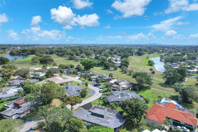 5820 Australian Pine Dr, Tamarac, FL 33319 - aerial perspective of suburban area with a nearby body of water and a golf course