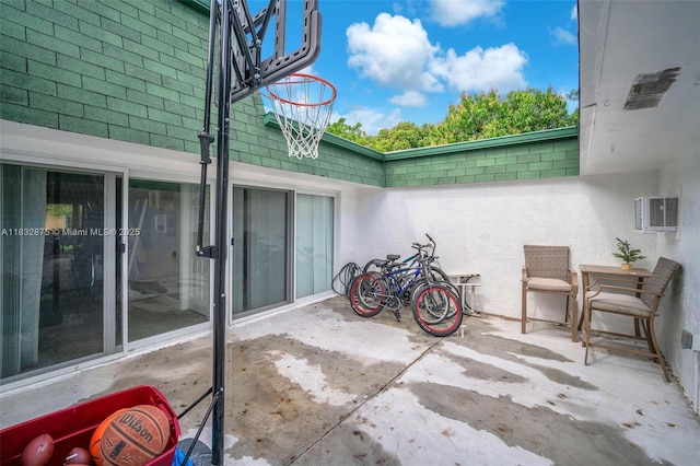 5820 Australian Pine Dr, Tamarac, FL 33319 - view of patio featuring a wall unit AC