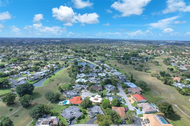 5820 Australian Pine Dr, Tamarac, FL 33319 - aerial overview of property's location with a large body of water and nearby suburban area