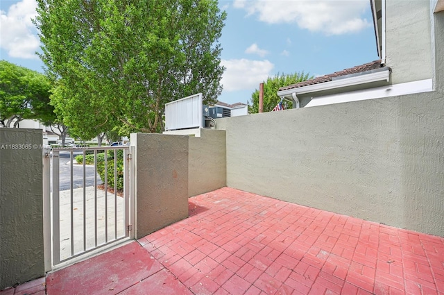 2456 SE 19th Ct, Homestead, FL 33035 - view of patio / terrace featuring a gate