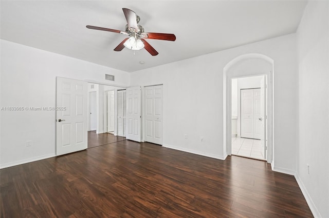 2456 SE 19th Ct, Homestead, FL 33035 - spare room with ceiling fan, wood finished floors, and arched walkways