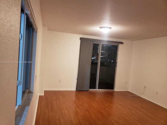 36 NW 6th Ave Unit 906, Miami, FL 33128 - unfurnished room featuring wood finished floors