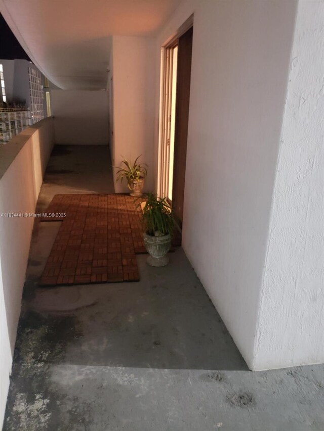 36 NW 6th Ave Unit 906, Miami, FL 33128 - corridor with unfinished concrete floors