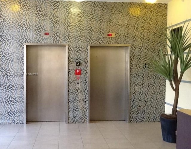 36 NW 6th Ave Unit 906, Miami, FL 33128 - lobby featuring tile walls