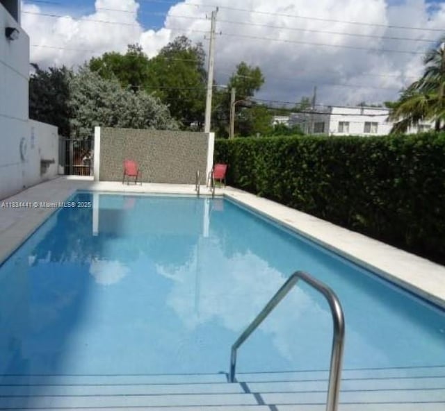 36 NW 6th Ave Unit 906, Miami, FL 33128 - view of swimming pool featuring a fenced backyard