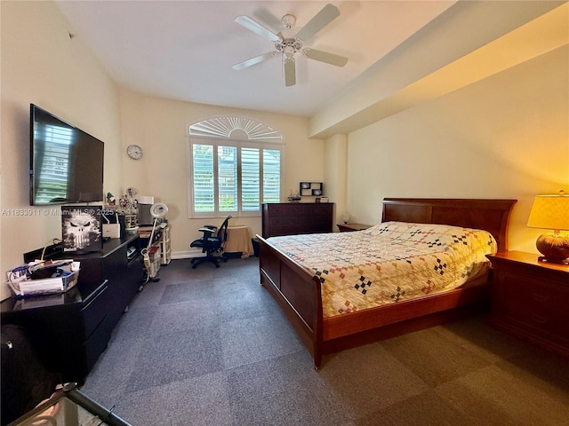 3001 NE 185th St Unit 112, Aventura, FL 33180 - bedroom with dark colored carpet, an office area, and a ceiling fan