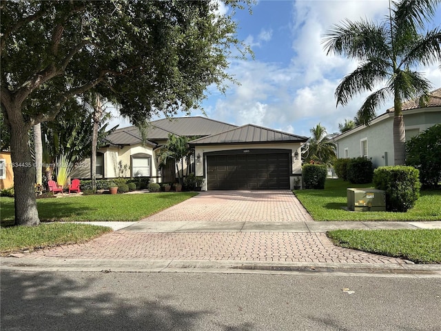 10975 NW 56th Ct, Coral Springs, FL 33076 - ranch-style home with decorative driveway, a garage, a front lawn, stucco siding, and a metal roof