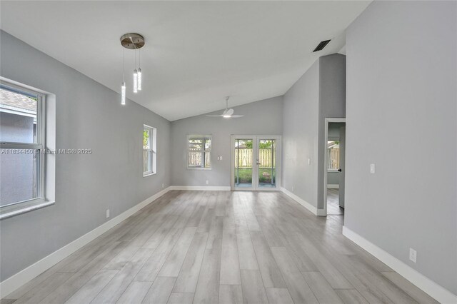 2349 NW 34th Ave, Coconut Creek, FL 33066 - empty room featuring a ceiling fan, light wood-type flooring, and high vaulted ceiling
