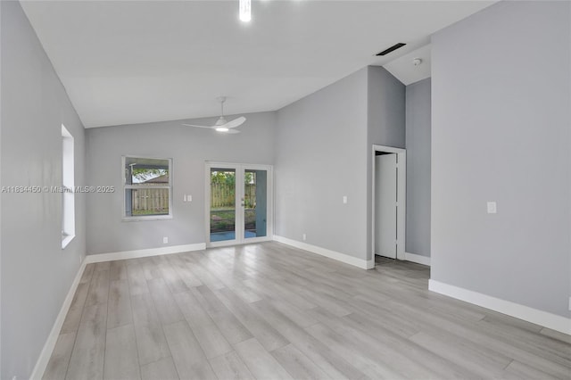 2349 NW 34th Ave, Coconut Creek, FL 33066 - unfurnished room featuring ceiling fan, light wood-style floors, a smoke detector, and high vaulted ceiling