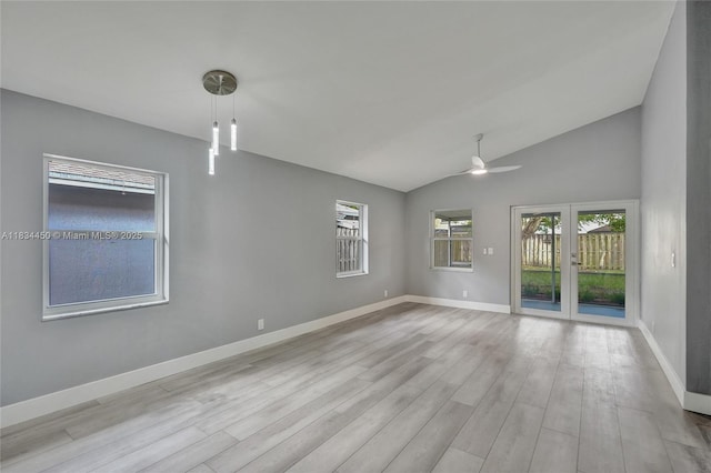 2349 NW 34th Ave, Coconut Creek, FL 33066 - spare room featuring wood finished floors, ceiling fan, and lofted ceiling