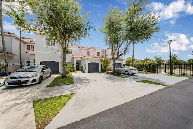 985 SW 147th Ct, Miami, FL 33194 - mediterranean / spanish home with driveway, a tiled roof, and stucco siding