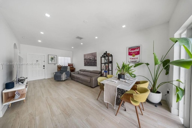 985 SW 147th Ct, Miami, FL 33194 - living room featuring light wood-style floors, arched walkways, and recessed lighting