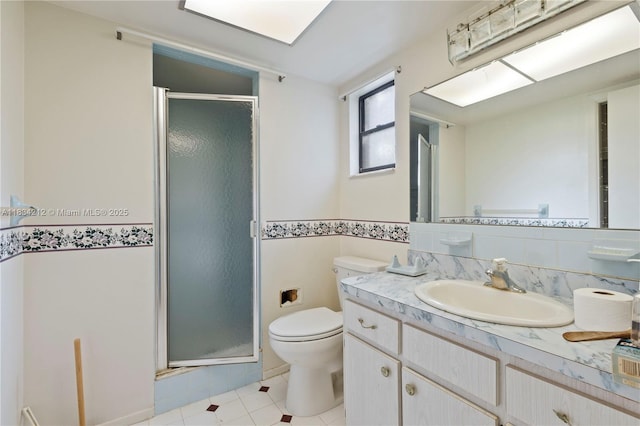 12738 Split Oak Dr, Hudson, FL 34667 - bathroom with vanity, a shower stall, and tile patterned flooring