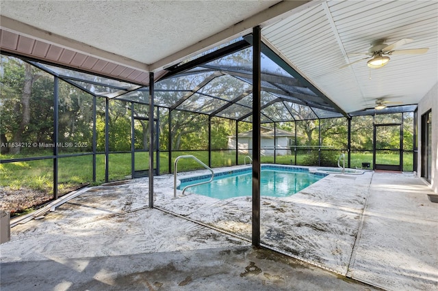 12738 Split Oak Dr, Hudson, FL 34667 - view of pool with a patio area, ceiling fan, a pool with connected hot tub, glass enclosure, and a storage shed