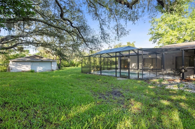 12738 Split Oak Dr, Hudson, FL 34667 - view of grassy yard with an outdoor pool and glass enclosure