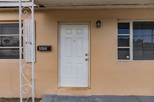 4423 Lake Ave, West Palm Beach, FL 33405 - property entrance featuring stucco siding