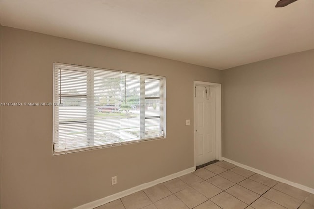 4423 Lake Ave, West Palm Beach, FL 33405 - spare room with light tile patterned floors and ceiling fan
