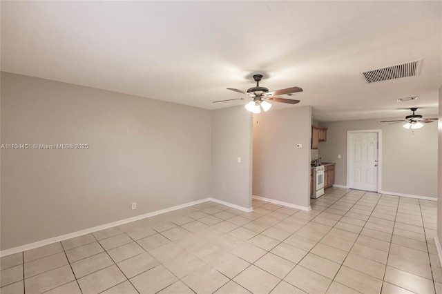 4423 Lake Ave, West Palm Beach, FL 33405 - spare room featuring ceiling fan and light tile patterned flooring
