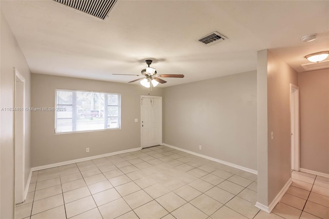 4423 Lake Ave, West Palm Beach, FL 33405 - unfurnished room featuring a smoke detector, light tile patterned flooring, and ceiling fan