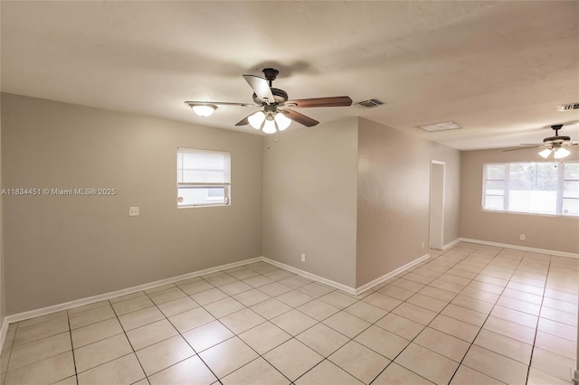 4423 Lake Ave, West Palm Beach, FL 33405 - unfurnished room with a ceiling fan, healthy amount of natural light, and light tile patterned floors