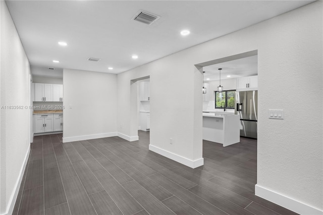 4879 NW 2nd Ct, Plantation, FL 33317 - empty room featuring recessed lighting and dark wood-style floors