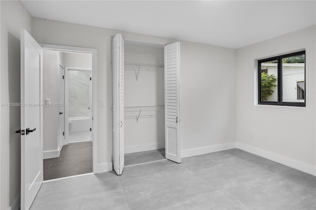 4879 NW 2nd Ct, Plantation, FL 33317 - unfurnished bedroom with a closet and baseboards