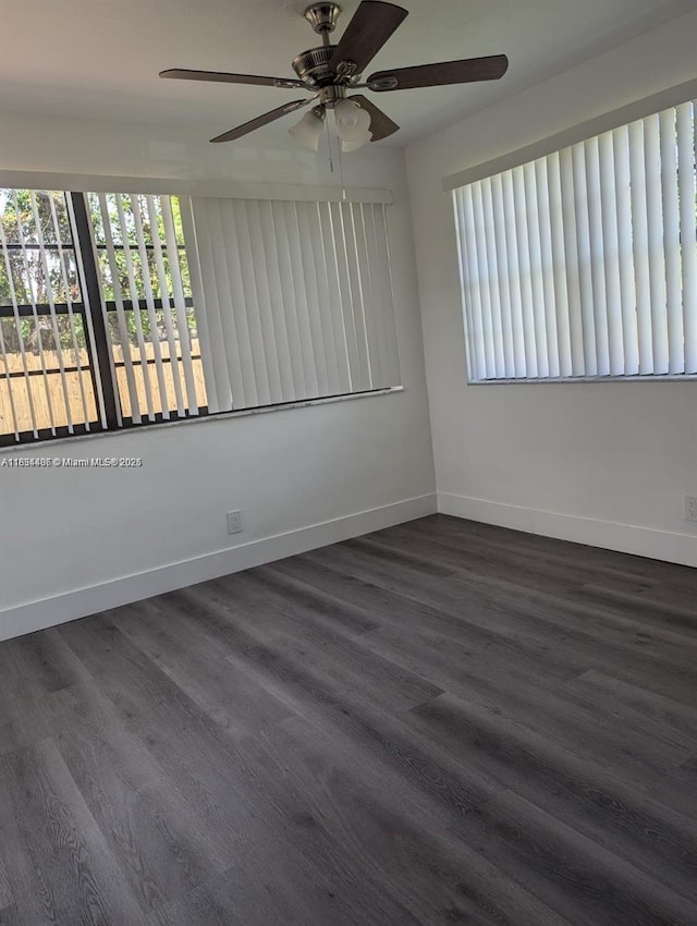 6137 Dewey St, Hollywood, FL 33023 - spare room featuring a ceiling fan and dark wood-style floors