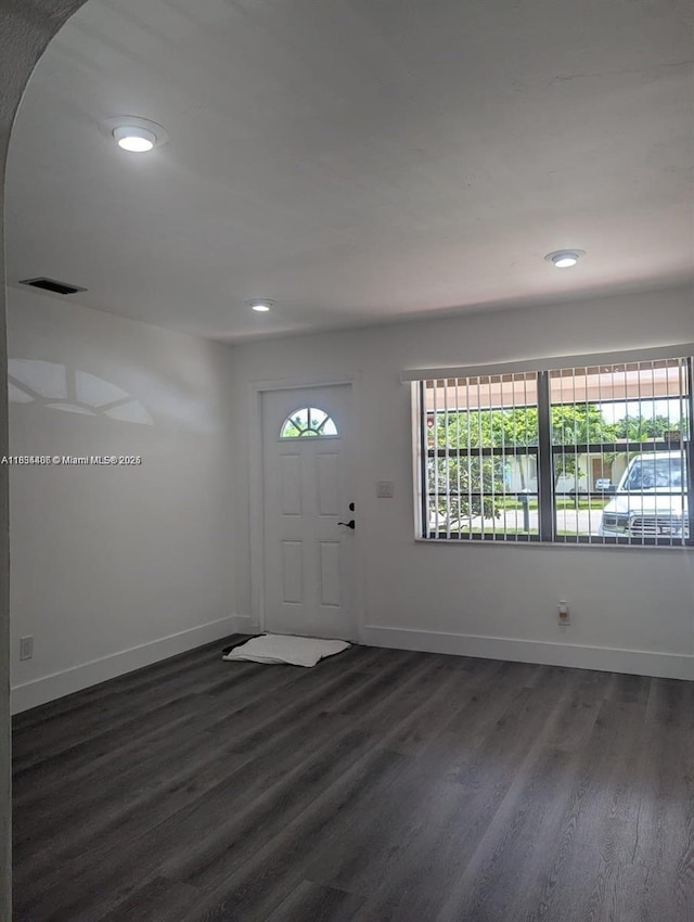 6137 Dewey St, Hollywood, FL 33023 - foyer entrance with dark wood-style floors and recessed lighting