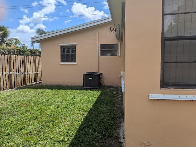 6137 Dewey St, Hollywood, FL 33023 - view of side of home featuring stucco siding