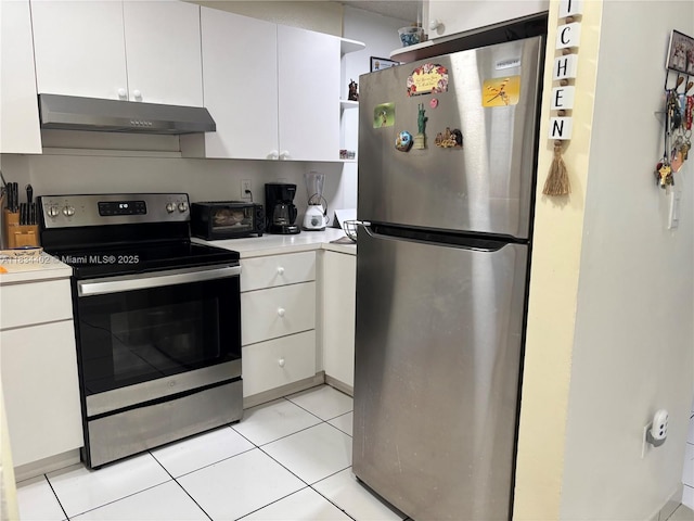 2775 W 52nd St Unit 305, Hialeah, FL 33016 - kitchen featuring appliances with stainless steel finishes, extractor fan, light countertops, and white cabinets