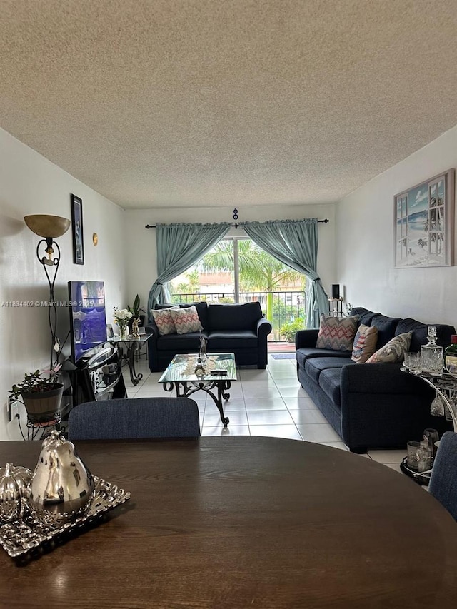 2775 W 52nd St Unit 305, Hialeah, FL 33016 - living area with a textured ceiling