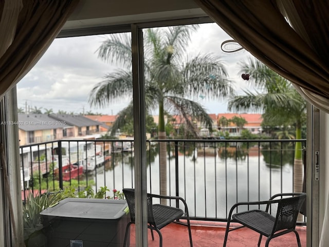 2775 W 52nd St Unit 305, Hialeah, FL 33016 - balcony with a water view