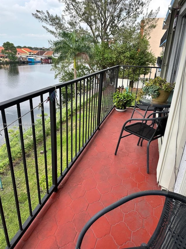 2775 W 52nd St Unit 305, Hialeah, FL 33016 - balcony with a water view