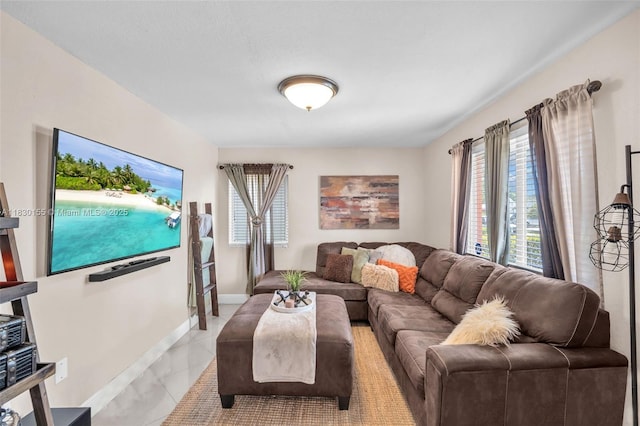 2175 NW 50th St, Miami, FL 33142 - living room featuring baseboards