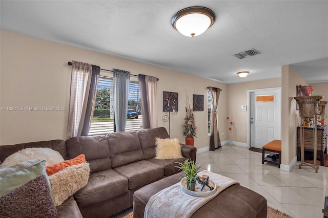 2175 NW 50th St, Miami, FL 33142 - living area with light tile patterned floors and baseboards