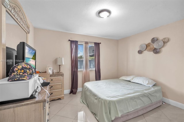 2175 NW 50th St, Miami, FL 33142 - bedroom with light tile patterned floors