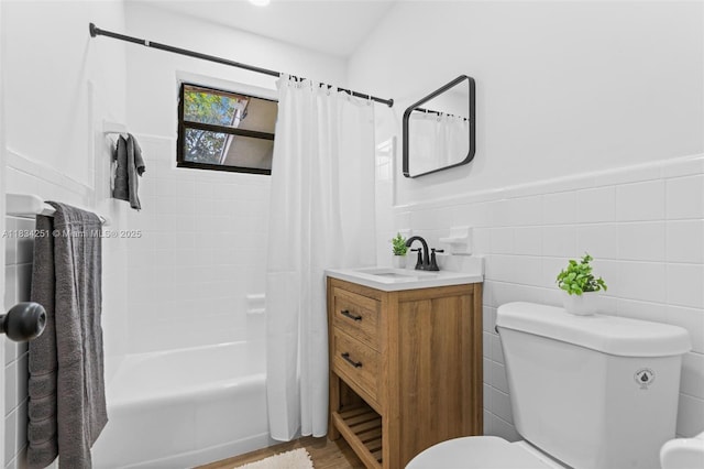 20620 Anchor Rd, Cutler Bay, FL 33189 - full bathroom with vanity, shower / bath combo, wood finished floors, a wainscoted wall, and tile walls